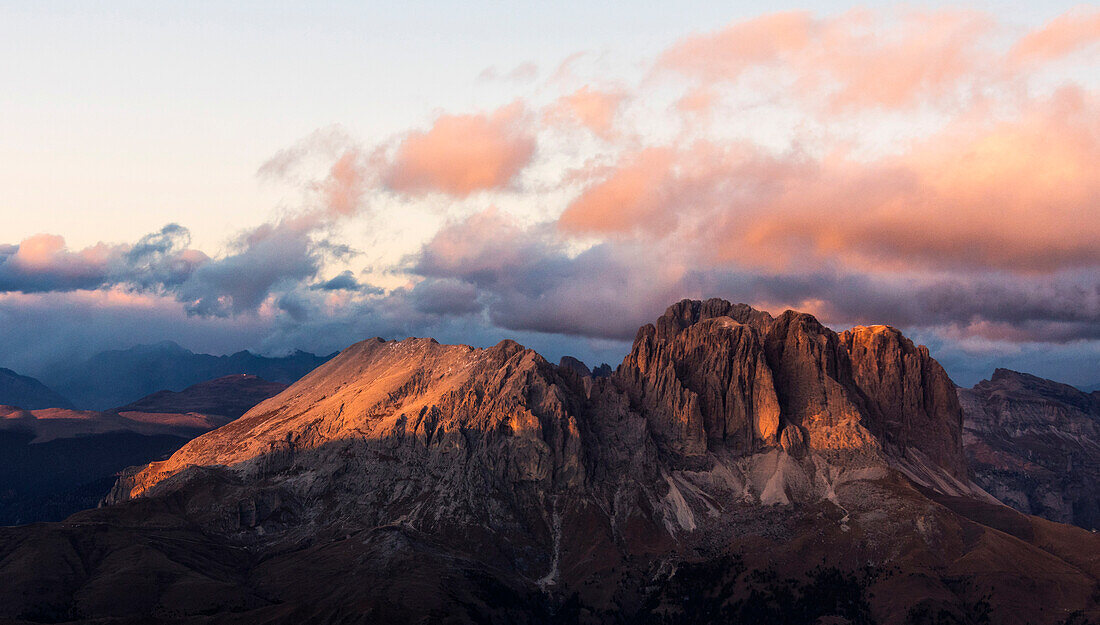 Aerial view of Sassolungo and Sassopiatto mountain range at sunset, Dolomites, South Tyrol, Italy, Europe