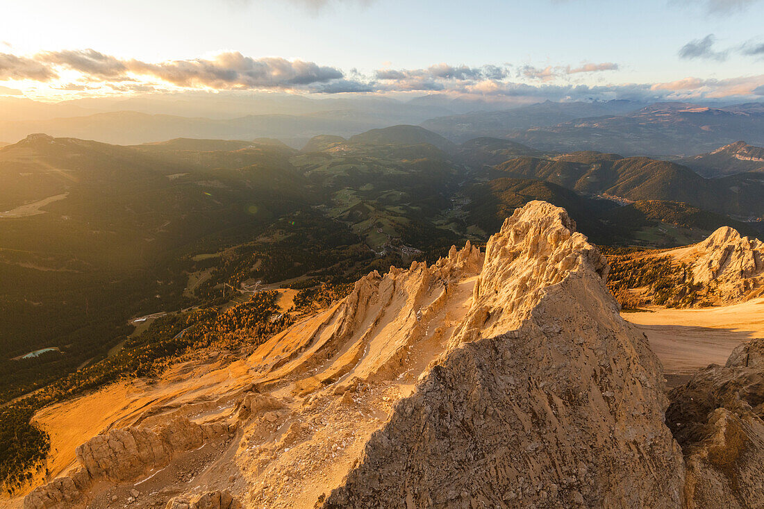 Aerial view of Latemar massif and Obereggen at sunset, Dolomites, South Tyrol, Italy, Europe