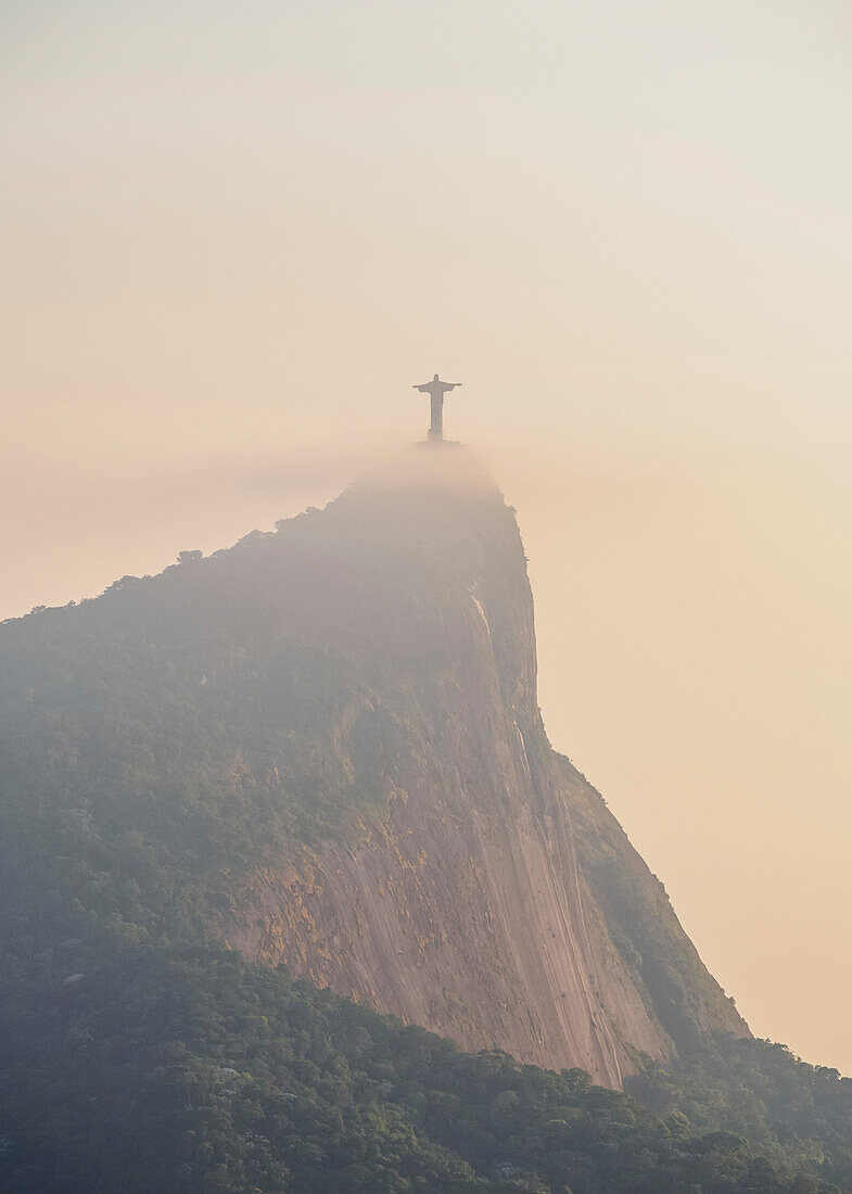 Christ the Redeemer and Corcovado Mountain at sunrise, Rio de Janeiro, Brazil, South America
