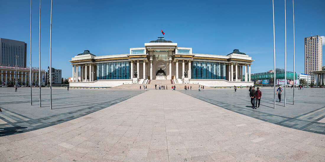 Tourists in Sukhbaatar square with Government palace, Ulan Bator, Mongolia, Central Asia, Asia