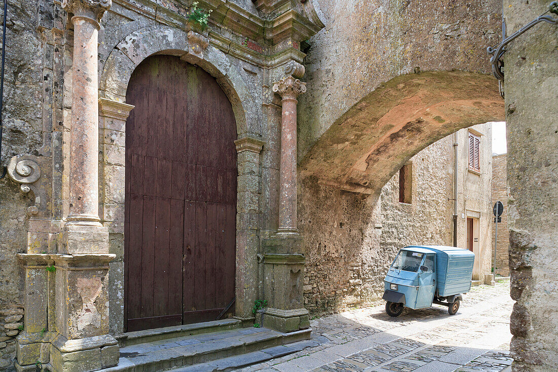 Erice, small truck parked under arch in back street, Sicily, Italy, Europe