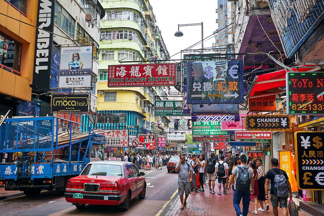A busy street in Mong Kok (Mongkok), Kowloon, Hong Kong, China, Asia