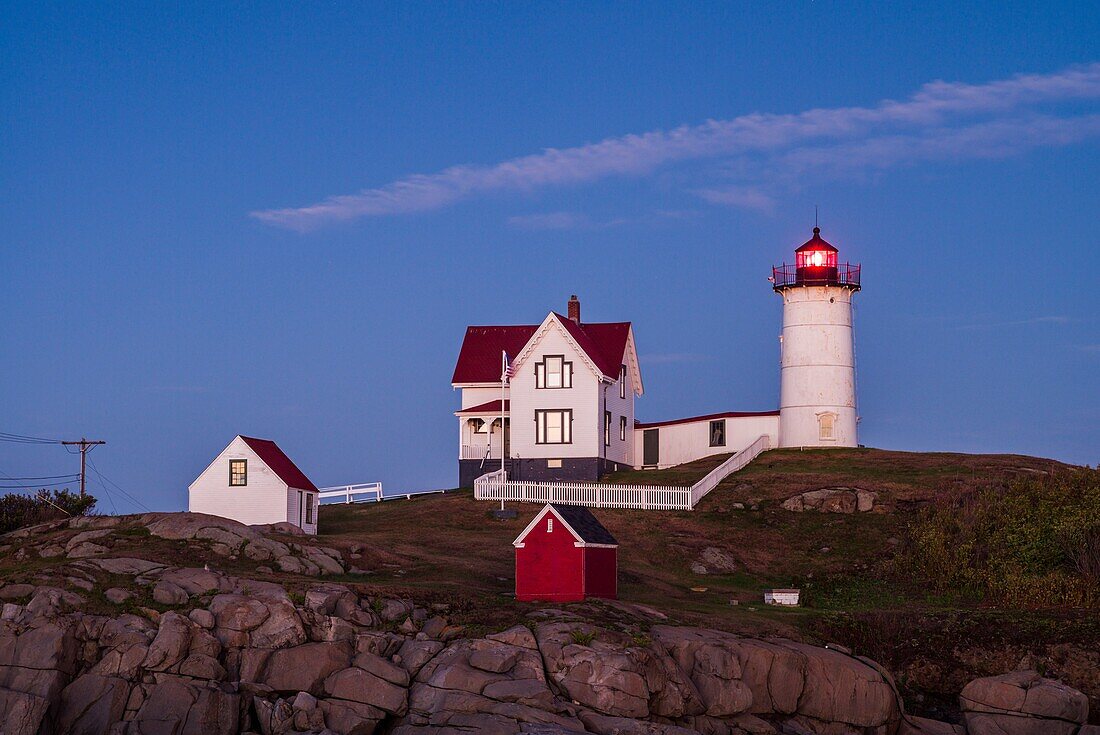 USA, Maine, York, Nubble Light Lighthouse, dusk.