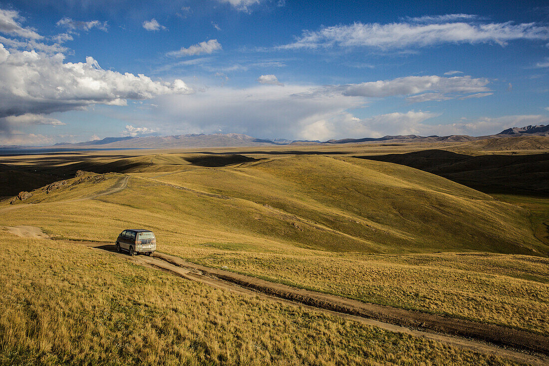 Car at Song Kol Lake in Kyrgyzstan, Asia