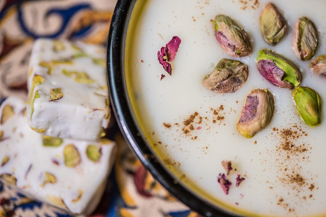Iranian gaz and ricepudding fereni with pistachios, Iran, Asien