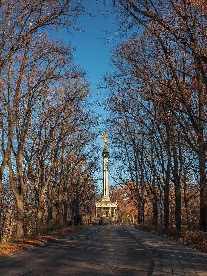 View through the trees on the Friedensdenkmal on a sunny winter day, Munich, Upper Bavaria, Germany