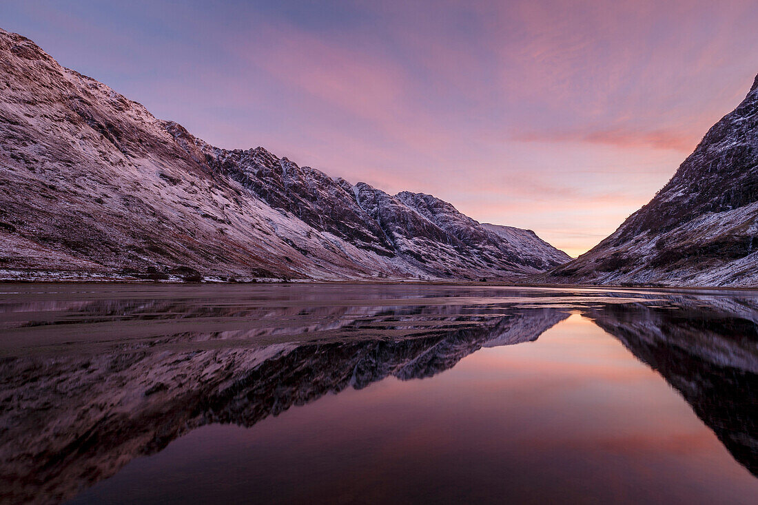 Loch Achtriochtan in winter with snow-capped mountains and reflections, Glencoe, Highlands, Scotland, United Kingdom, Europe