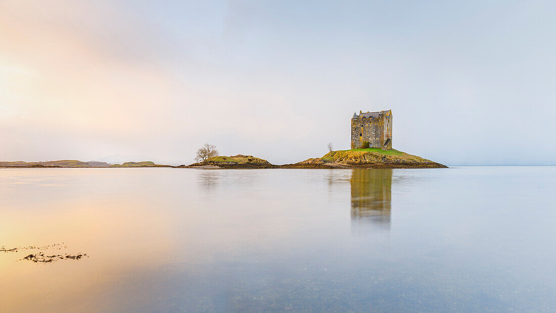 Castle Stalker on its own island in Loch Linnhe surrounded by mist, Argyll, Scottish Highlands, Scotland, United Kingdom, Europe