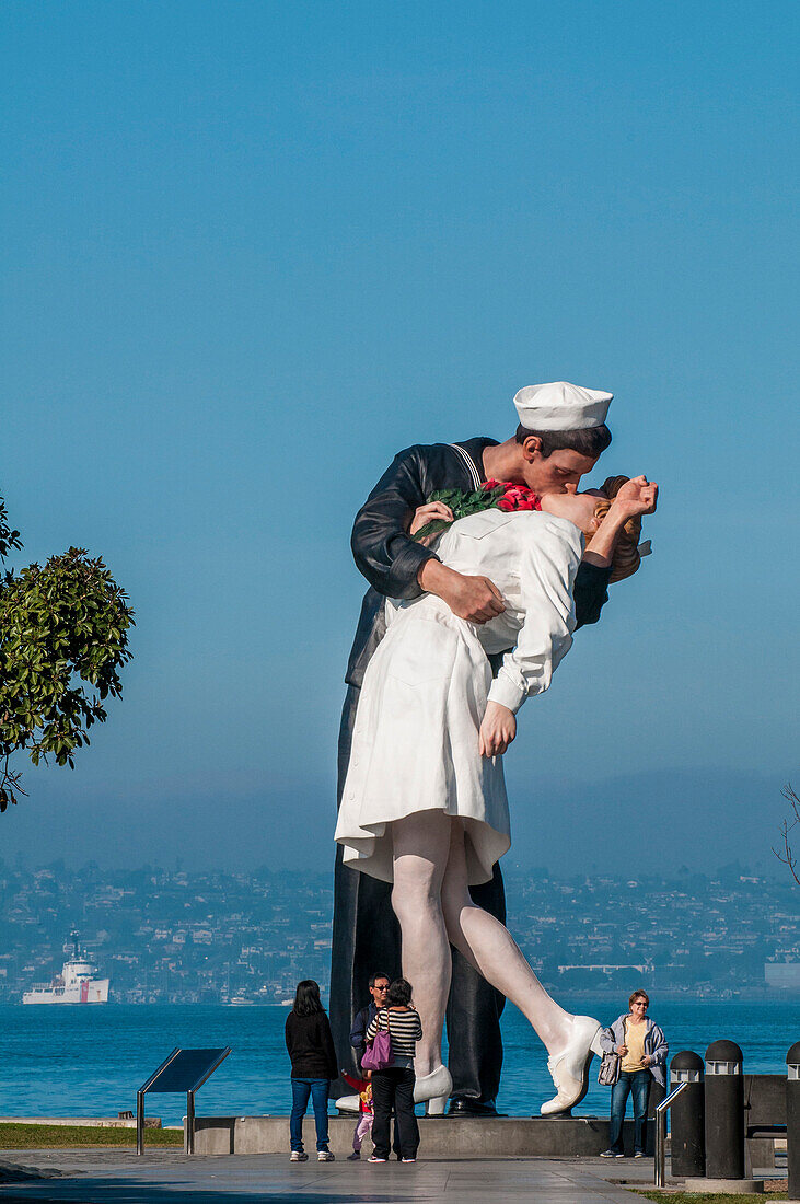 Unconditional Surrender sculpture by Seward Johnson at the USS Midway (aircraft carrier) Museum, San Diego Harbor, San Diego, California, United States of America, North America