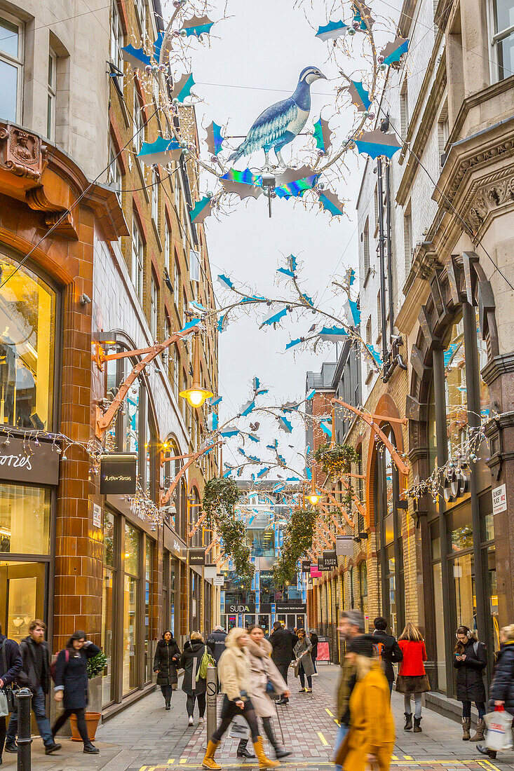 Christmas decorations in Slingsby Place, London, England, United Kingdom, Europe