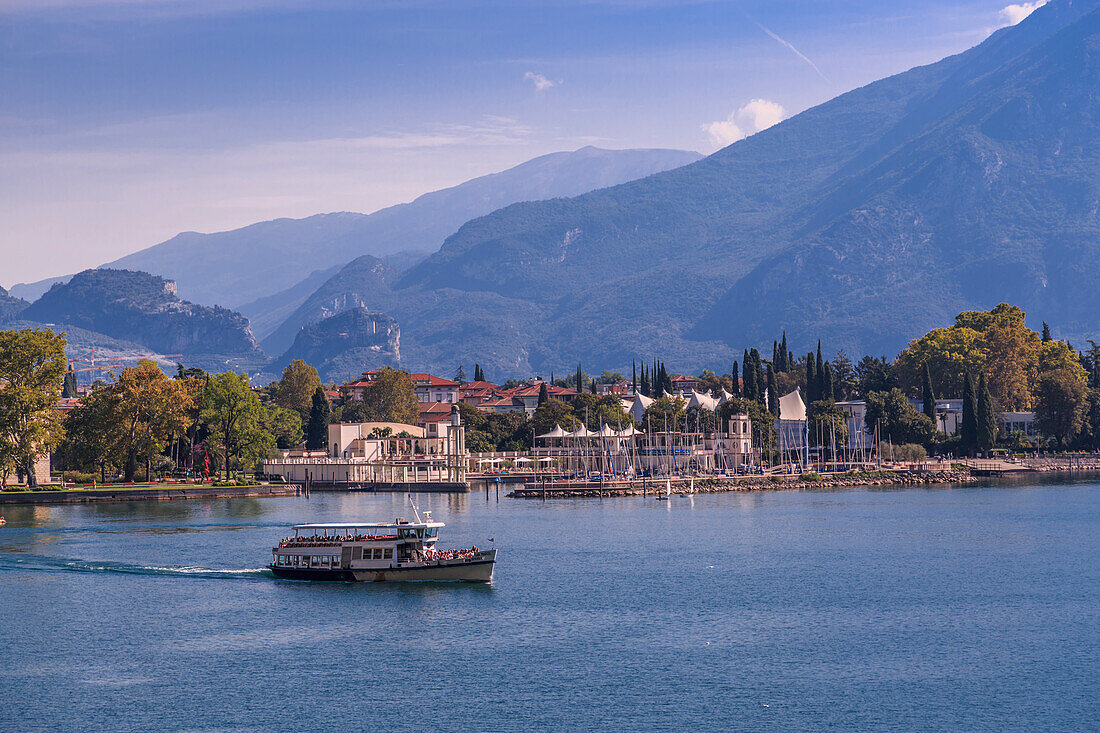 View of ferry leaving the harbour of Riva del Garda, Lake Garda, Trentino, Italian Lakes, Italy, Europe