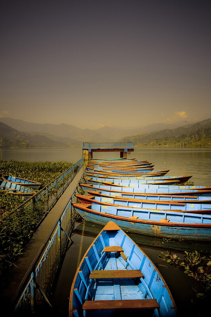 Boats at harbour on Fewa Lake, Pokhara, Nepal, Asia