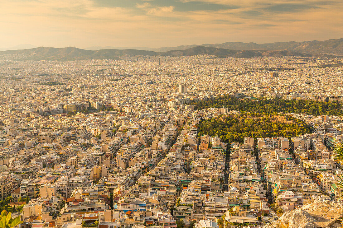 View of North Athens suburbs from Likavitos Hill in late afternoon, Athens, Greece, Europe