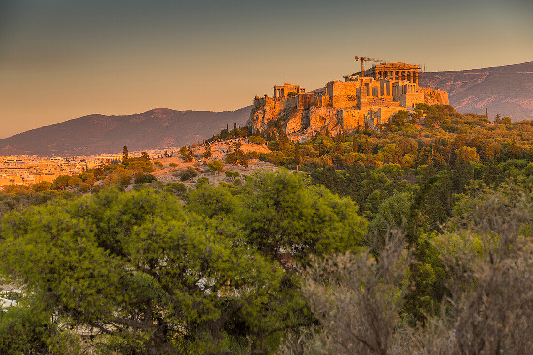 View of The Acropolis, UNESCO World Heritage Site, at sunset from Filopappou Hill, Athens, Greece, Europe