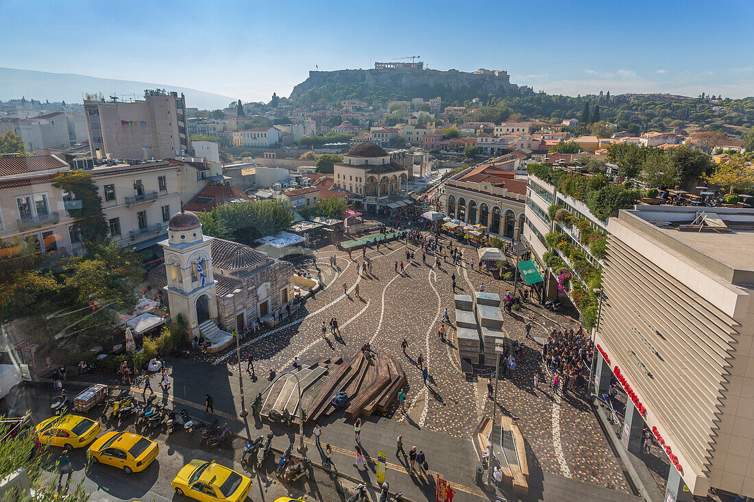 Elevated view of taxis, shoppers and Greek Orthodox Church in Monastiraki Square, Acropolis visible in background, Monastiraki District, Athens, Greece, Europe