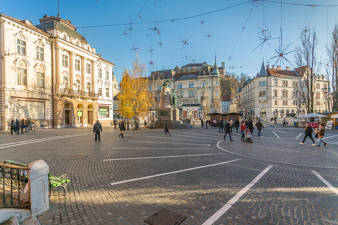 Ornate architecture in Plaza Presernov and castle visible in background, Ljubljana, Slovenia, Europe