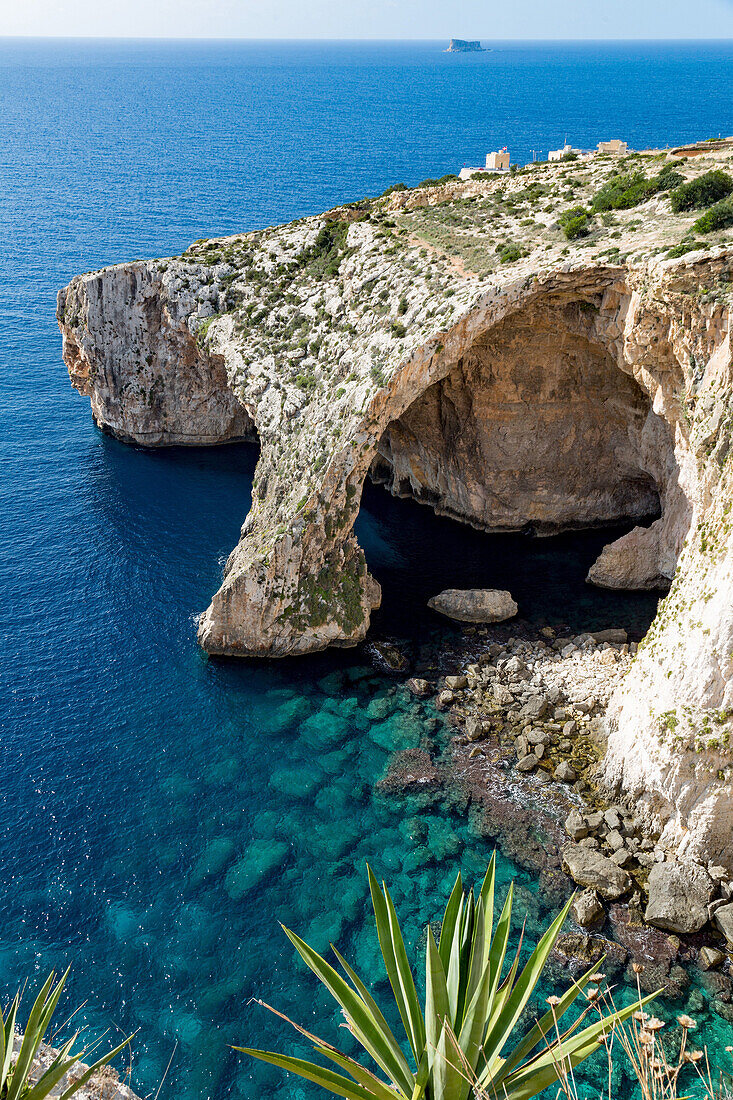 The dramatic natural arch at the Blue Grotto, Malta, Mediterranean, Europe