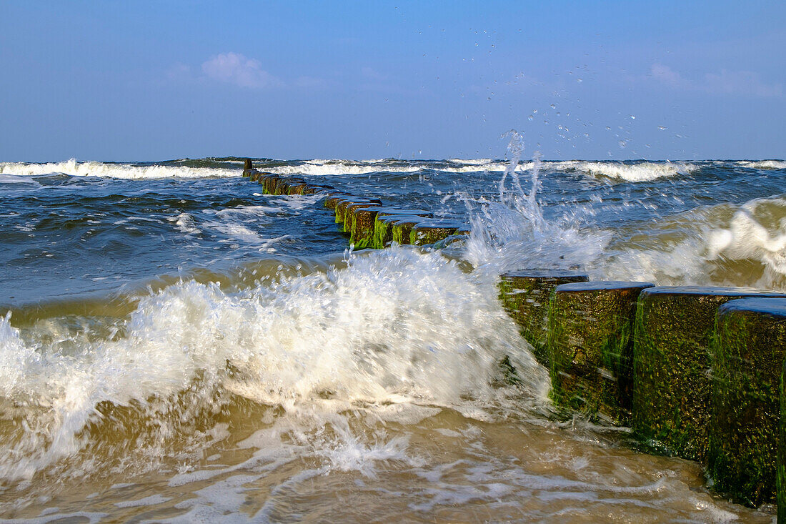 Waves beating against groynes on the beach, Bansin, Usedom, Ostseeküste, Mecklenburg-Vorpommern, Germany