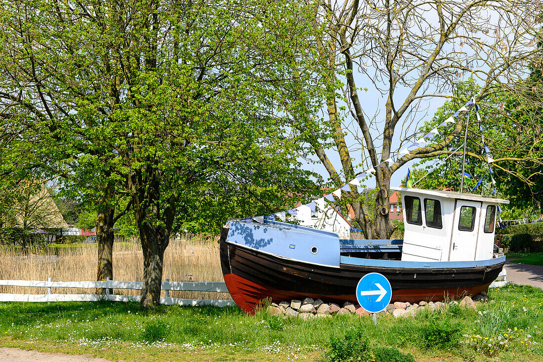 Old fishing boat as decoration in Gollwitz, island Poel, Ostseeküste, Mecklenburg-Western Pomerania, Germany