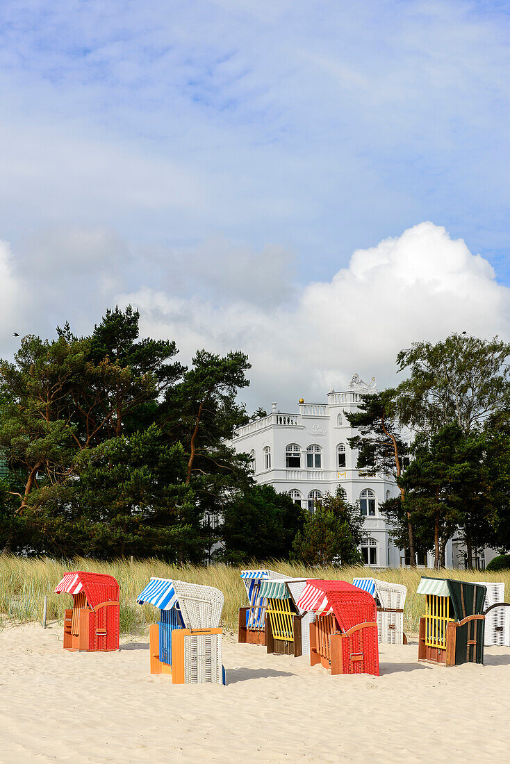 Beach with beach chairs with baeder architecture in Binz, Rügen, Ostseeküste, Mecklenburg-Western Pomerania, Germany