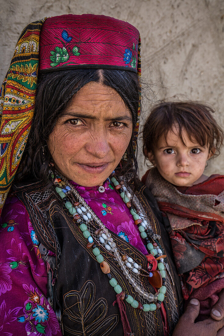 Wakhi mother with little child, Wakhan, Afghanistan, Asia