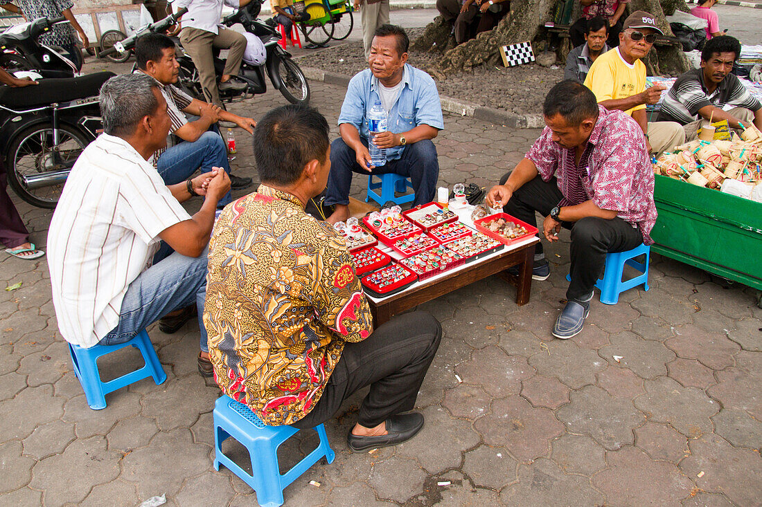 Men selling rings on the streets of Yogyakarta, Java, Indonesia, Southeast Asia, Asia