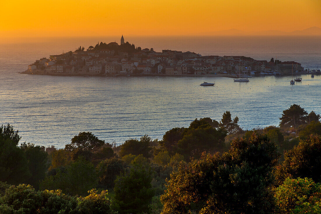 Elevated view over the old town of Primosten, situated on a small island, at sunset, Croatia, Europe