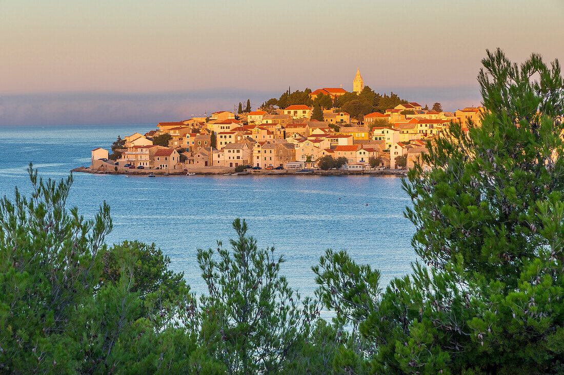 Elevated view over the old town of Primosten, situated on a small island, at sunrise, Croatia, Europe