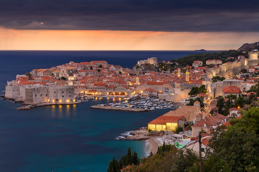 Elevated view over the old town of Dubrovnik at dusk, minutes before the rainfall, UNESCO World Heritage Site, Dubrovnik, Croatia, Europe