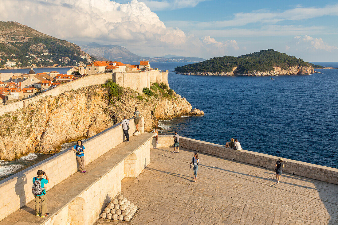 View from Lovrijenac Fortress to the city walls of the old town of Dubrovnik and Lokrum Island, Dubrovnik, Croatia, Europe