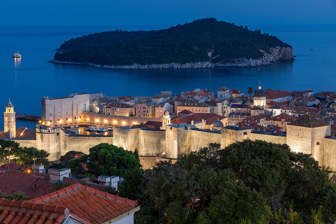 Elevated view from a lookout over the old town of Dubrovnik and Lokrum Island at dusk, Dubrovnik, Croatia, Europe