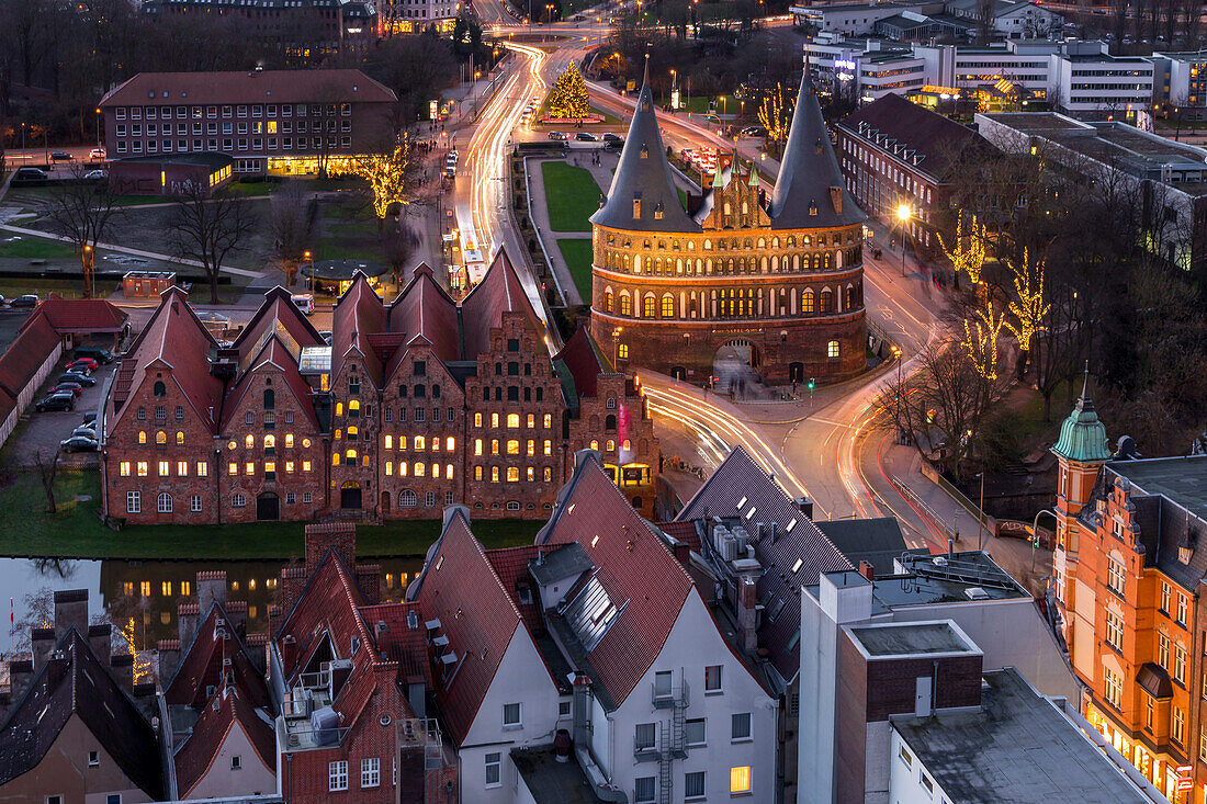 Elevated view from the St. Petri Church over the Holsten Gate in Lubeck at dusk, Lubeck, Schleswig-Holstein, Germany, Europe