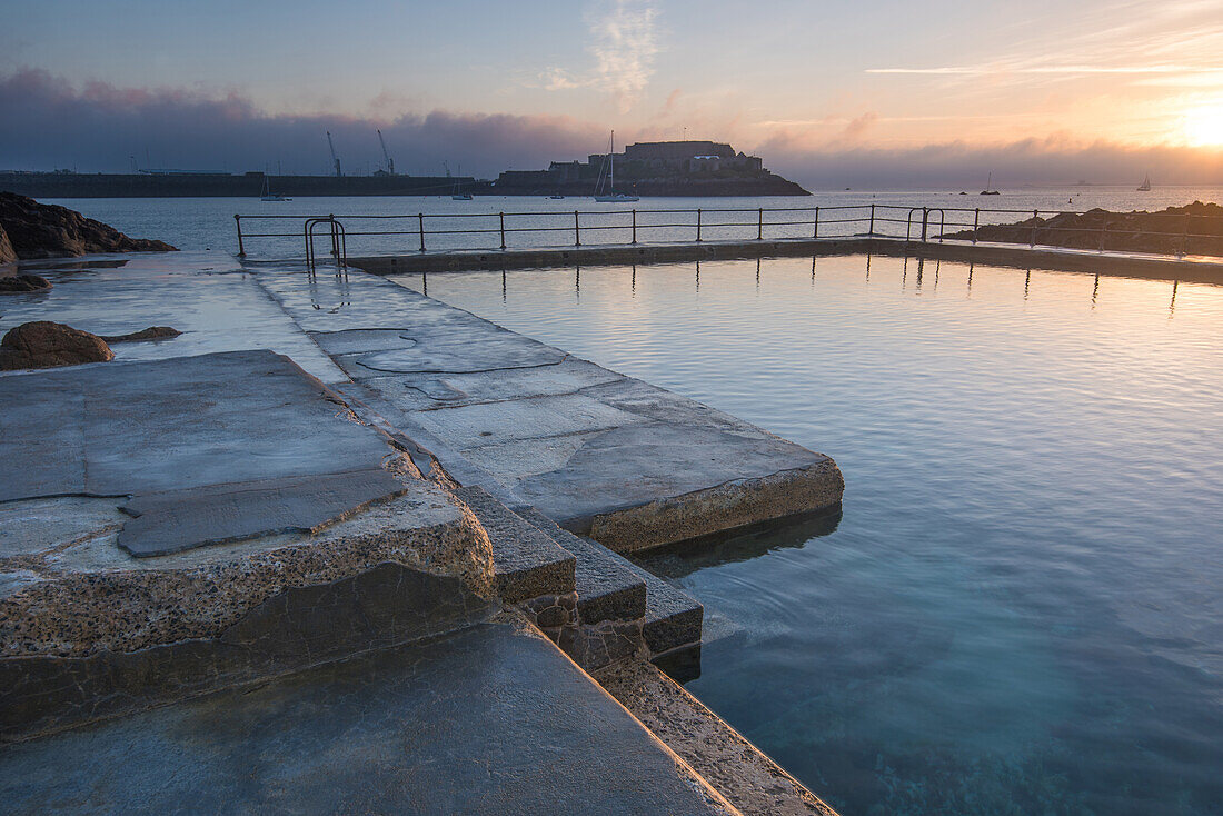 The Bathing pools and Castle Cornet in the background, St. Peters Port, Guernsey, Channel Islands, United Kingdom, Europe
