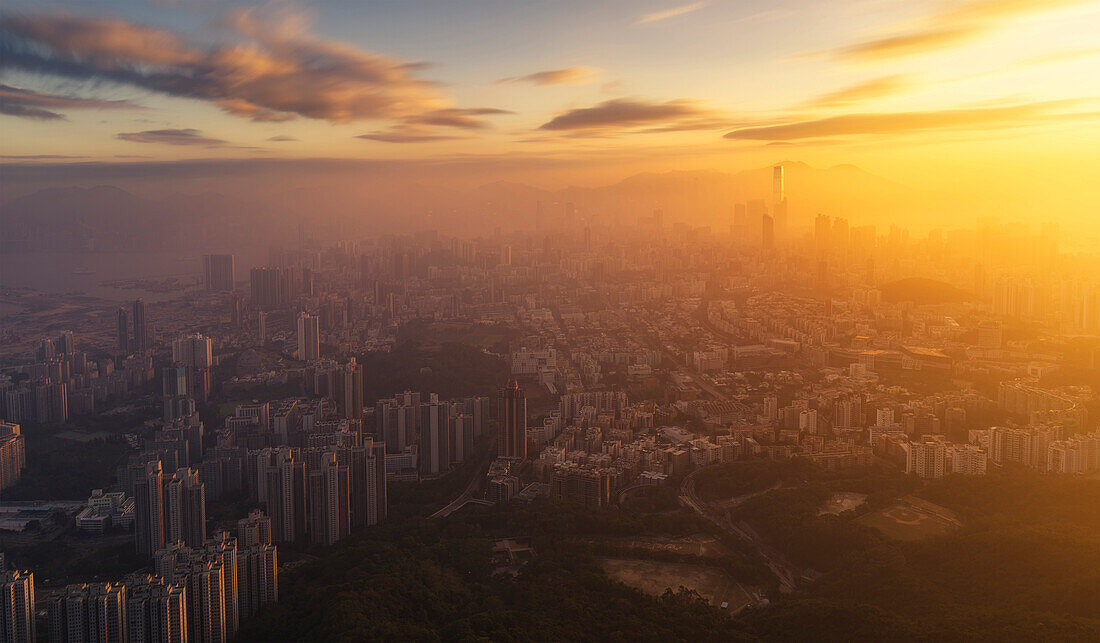 Kowloon and Hong Kong city view at sunset from the Lion Rock mountain peak, Hong Kong, China, Asia
