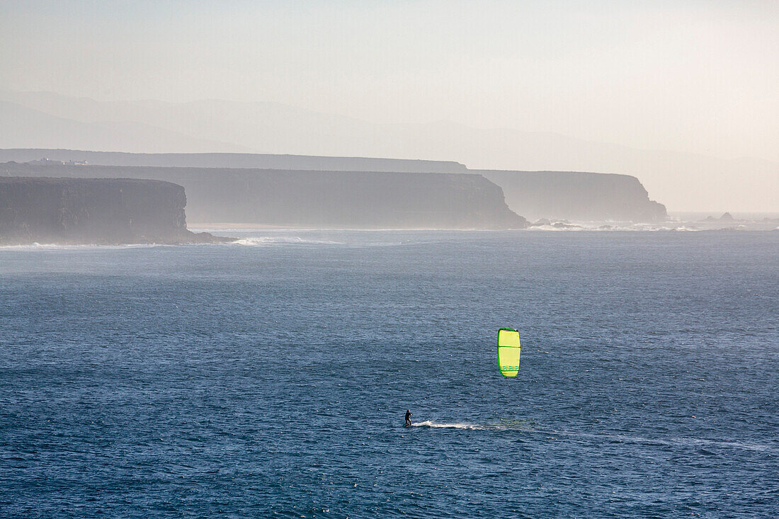 Windsurfer off El Cotillo beach on the volcanic island of Fuerteventura, Canary Islands, Spain, Atlantic, Europe