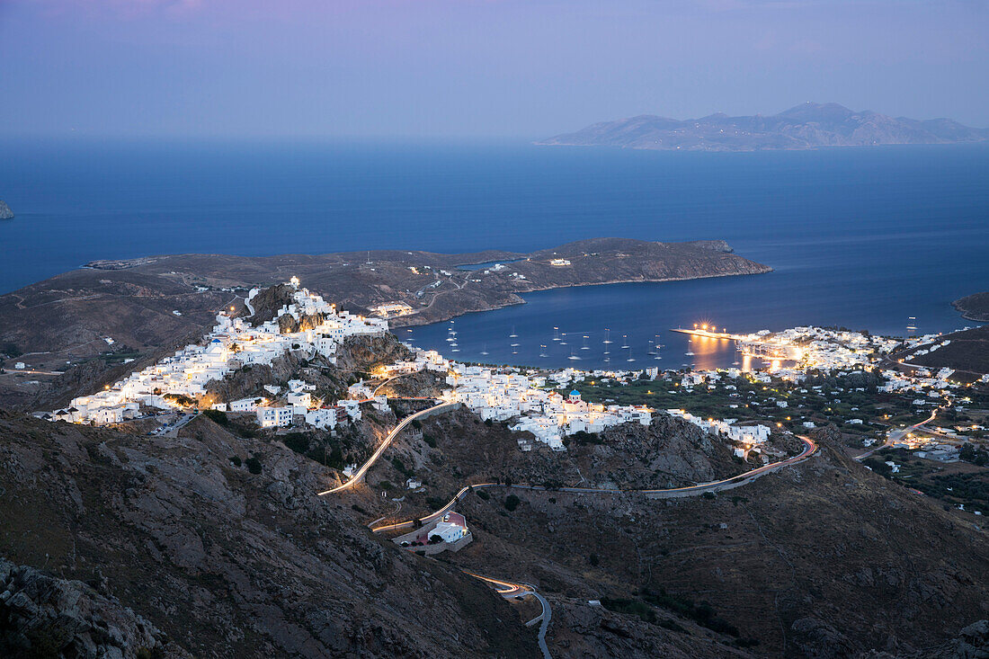 View over Livadi Bay and hilltop town of Pano Chora at night, Serifos, Cyclades, Aegean Sea, Greek Islands, Greece, Europe