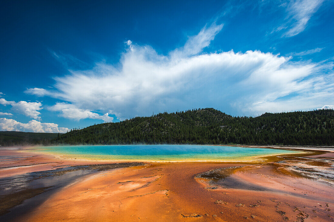 Cloud mirrors shape of Grand Prismatic Spring in Yellowstone National Park, Wyoming, USA