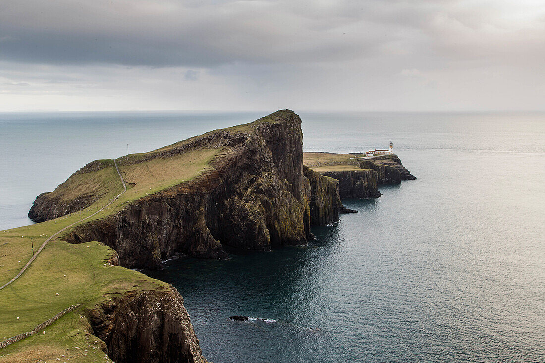 Coastal cliffs and Neist Point Lighthouse, Isle of Skye, Scotland, UK