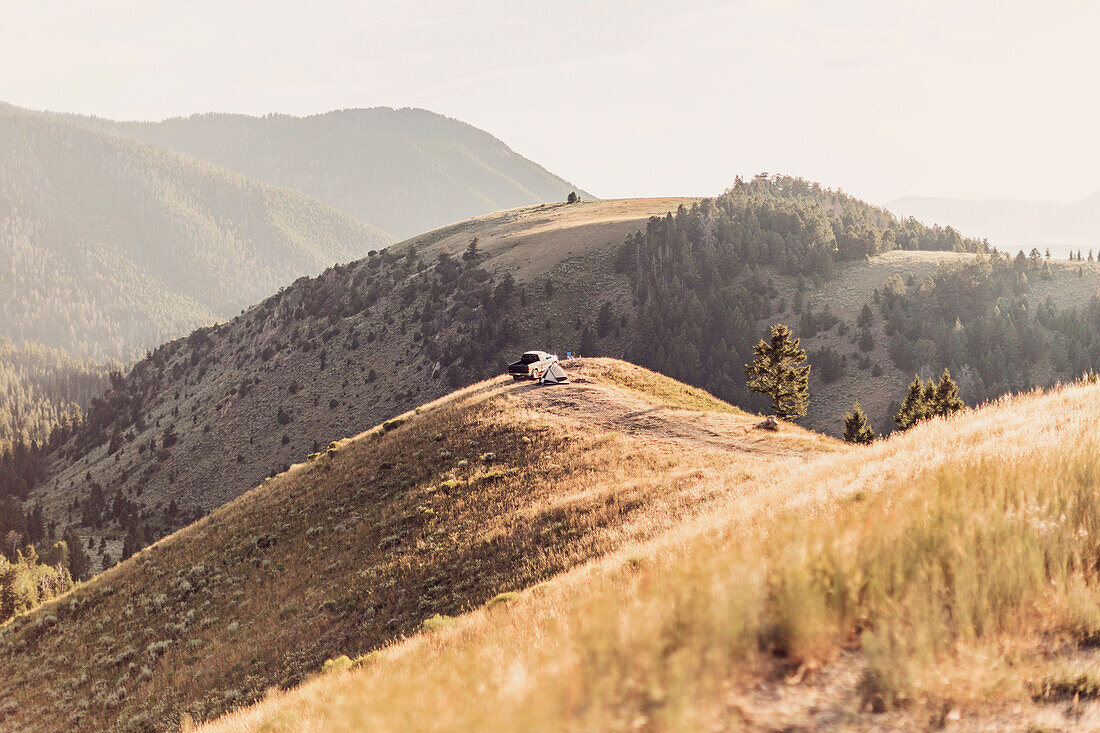 Car parked on top of hill in Curtis Canyon, Wyoming, USA