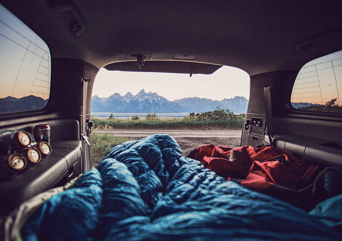 A room with a view. Camping in the back of the car on Shadow Mountain near Grand Teton National Park.