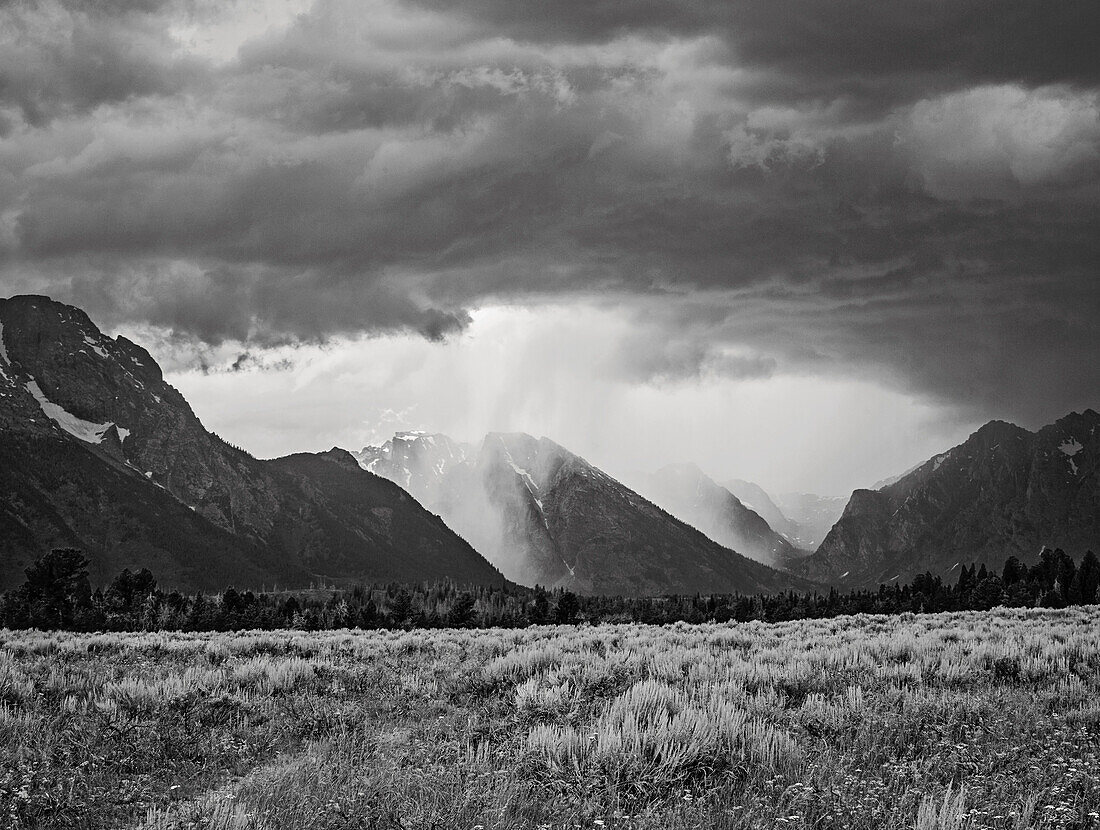Storm clouds passing over scenic landscape of Grand Teton National Park, Wyoming, USA