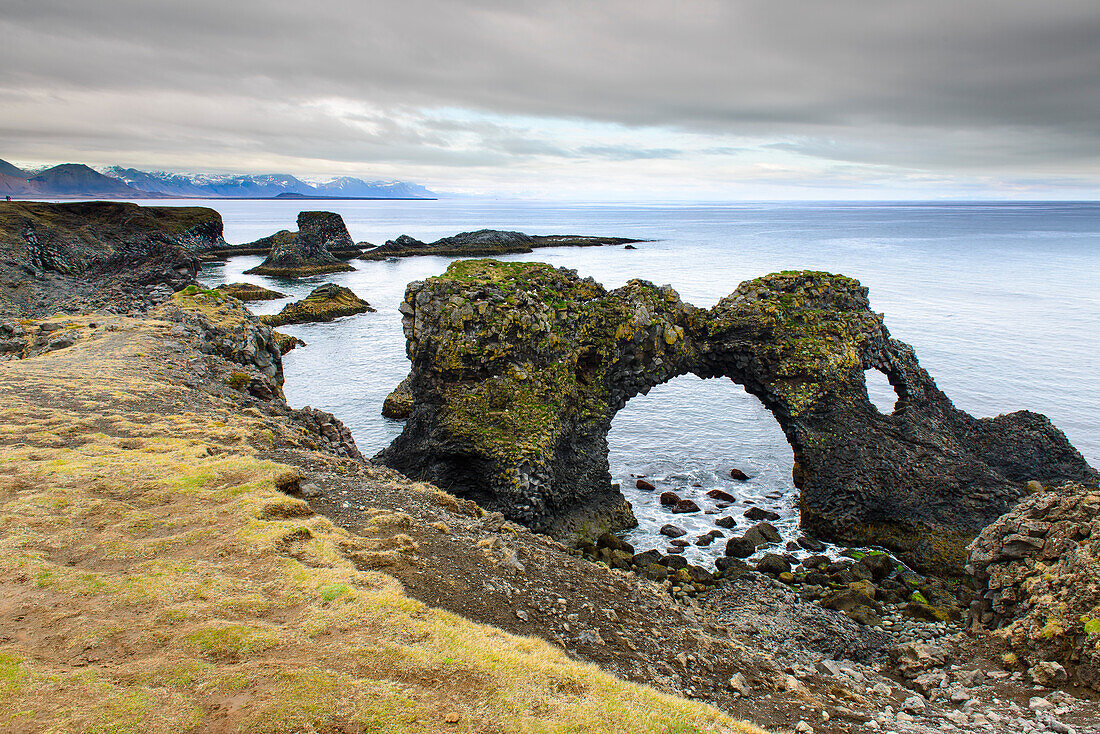 Stone arch Gatklettur at Arnarstapi, Snaefelsness peninsular, Iceland