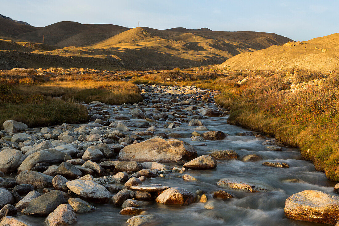 River flowing in mountain valley, Sarychat-Ertash Strict Nature Reserve, Tien Shan Mountains, eastern Kyrgyzstan