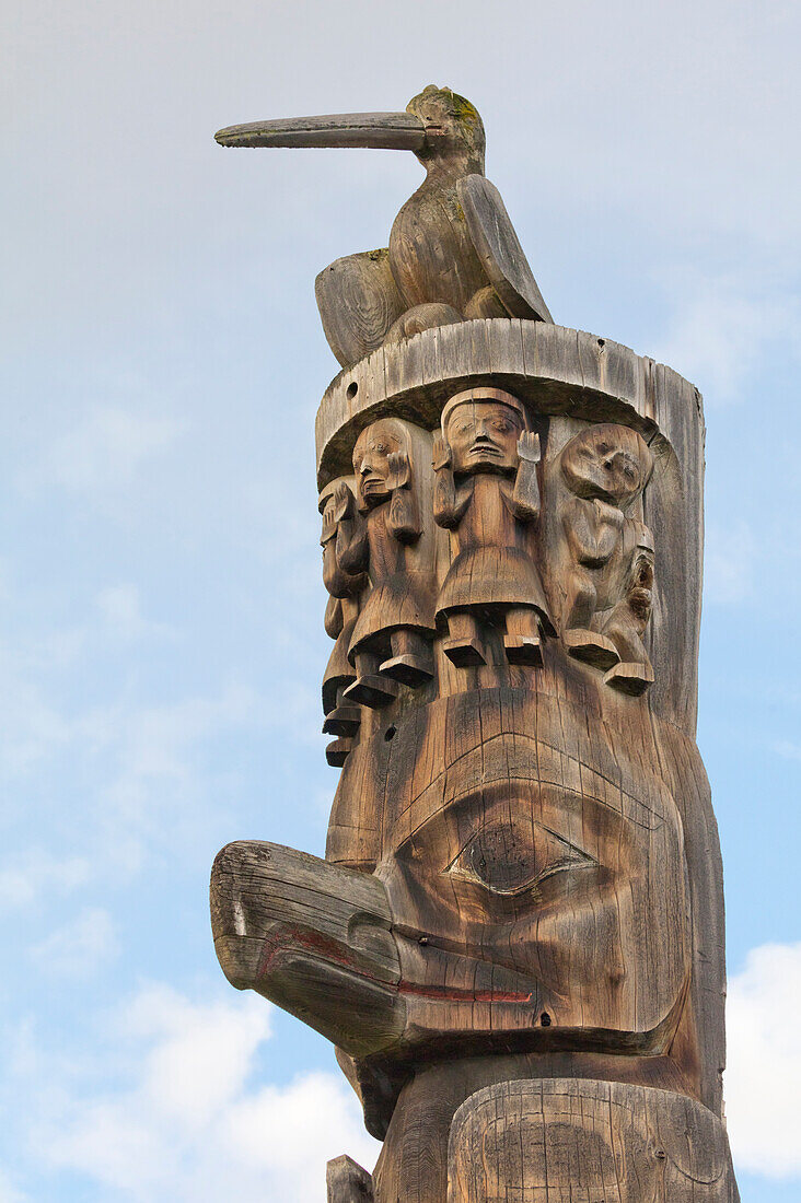 Traditional wood totem pole near Gitanyow, British Columbia, Canada