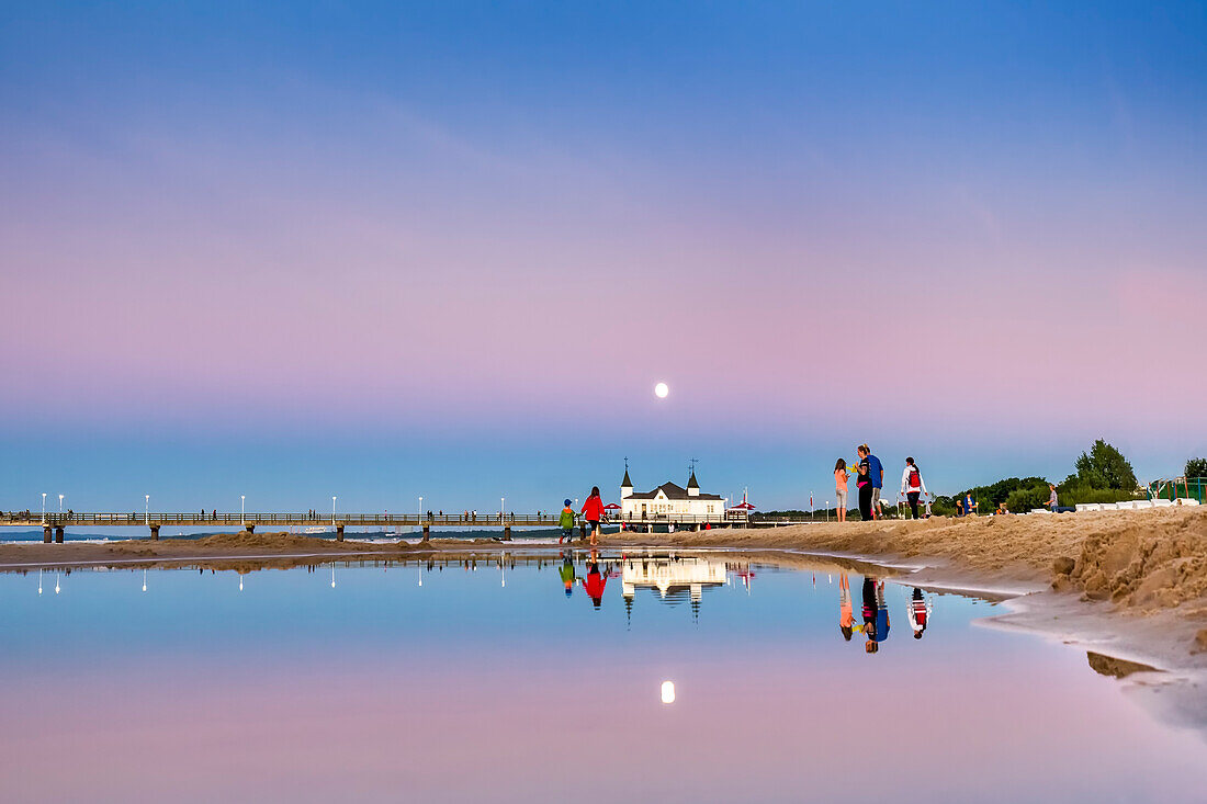 Full moon above pier, Ahlbeck, Usedom island, Mecklenburg-Western Pomerania, Germany