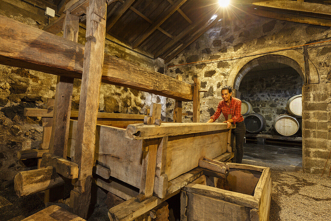 wine press, woman, Bodega Matias i Torres, Fuencaliente, UNESCO Biosphere Reserve, La Palma, Canary Islands, Spain, Europe