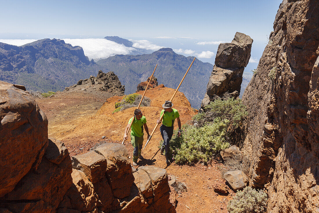 men jumping with the canarian crook, Salto del Pastor Canario, crater rim, Caldera de Taburiente, UNESCO Biosphere Reserve, La Palma, Canary Islands, Spain, Europe