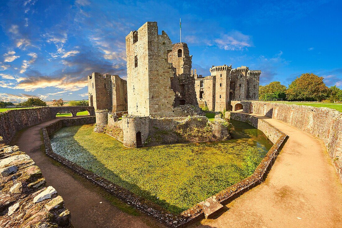 Raglan Castle (Welsh: Castell Rhaglan) a late medieval castle built by Sir William Thomas in the mid 1400â.s. Raglan Castle , Monmouthshire, Wales.