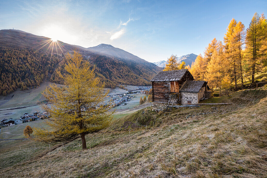 The sunrise in autumn day in Livigno, Province of Sondrio, Valtellina, Lombardy, Italy, Europe