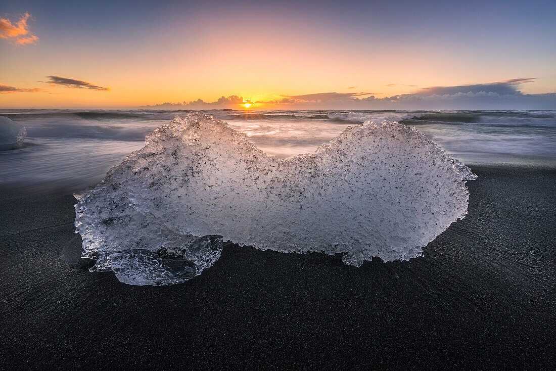 Jokulsarlon, East Iceland, Iceland. Ice formations on the beach at sunrise.